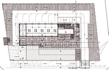 Een staaluitbouw aan de achterzijde met luifel zorgt voor de noodzakelijke uitbreiding van de werkplaats, terwijl de voorzijde met zijn glasuitbouw voor voldoende ruimte zorgt in de toonzaal.