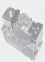 Figuur 10 : HONEYWELL gasklep (type 035-2 t.e.m. 064-2) 1 Gasinlaat 2 Gasuitlaat 3 Schroef inlaatdruk 4 Schroef uitlaatdruk 5 Aansluitklemmen 6.3mm AMP en schroeven voor bedrading 6 Aansluitklemmen 6.