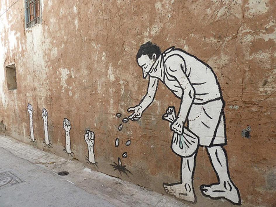 The Sprouting of Revolutionary Fists, muurtekening van Zoo Project, Tunis, Tunesië, maart-april 2011 Bron: Foto van Elissa Jobson voor de