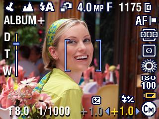 Datum en tijd instellen 1 Zet de camera aan. Druk op de Menu-knop. Aan de slag 2 Druk op om Setup (instellen) te markeren en druk vervolgens op de OK-knop.