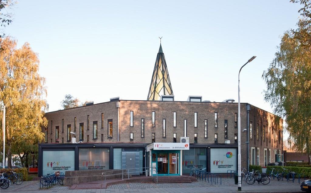 329 monument van de week 50 2018 Voormalige Pastoor van Arskerk, Beneluxlaan 74 Voormalig kerkgebouw dat nu in gebruik is als wijkcentrum en bibliotheek.