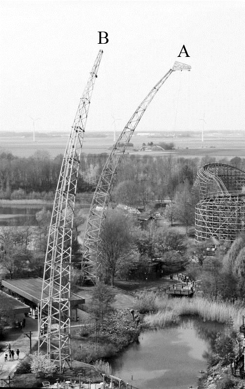 Opgave 1 Skydiver In attractiepark Walibi Holland staat de attractie figuur 1 Skydiver. De Skydiver bestaat uit twee masten (A en B). Zie figuur 1.