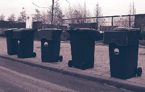 aan de voorzijde) Plaats de container met