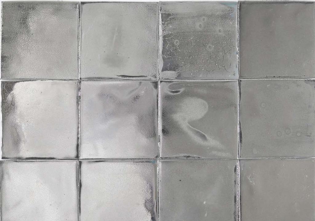LUSTER Bij Albarello maken we ook tegels met lusterglazuur. Hierop afgebeeld zijn onze tegels met echt zilver.