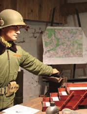 IN DE NAMIDDAG DE 4 THEMA S Het Bastogne War Museum in de voetsporen van Patton en McAuliffe Bezoek met gids* aan de slagvelden van Bastogne : Bos van de Vrede, Fox holes, Duits militair kerkhof in