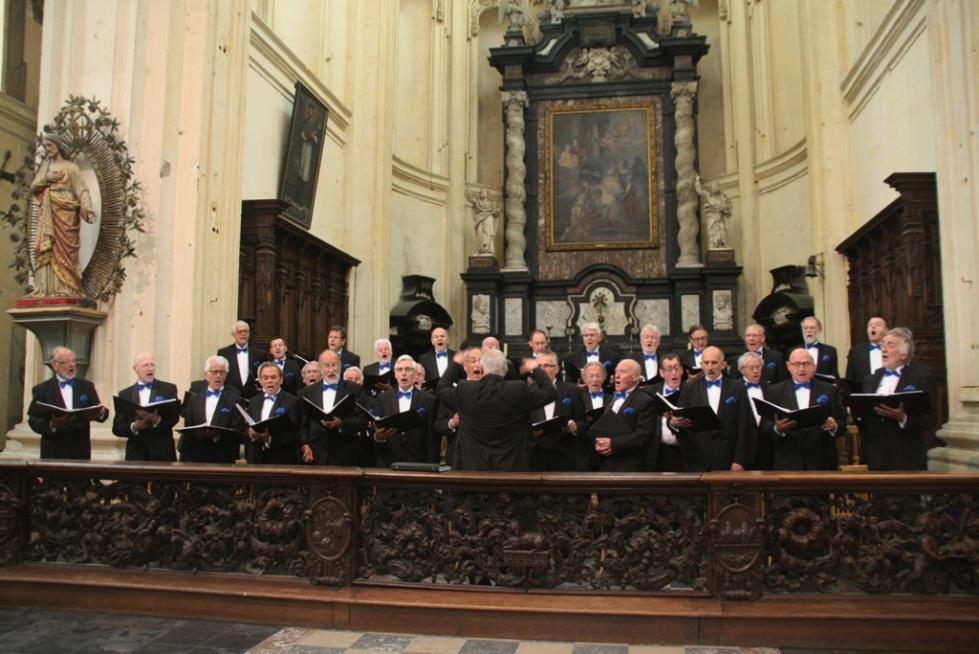 trum van Leuven in het kader van de Artiestenmissen 2013. Het RM zong zijn Missa Mundi De mis werd gelezen in drie talen, Vlaams, Engels en Spaans.