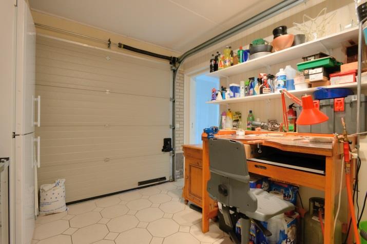 Garage/berging : De garage is voorzien van een