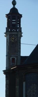 In tmidden de toren van de Nieuwen Bos en rechts ziet je het bovenste dak van de begijnhofkerk van O.L.V.