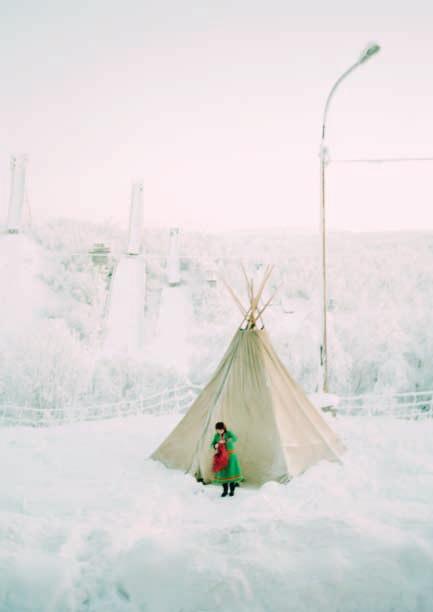 Saami girl in front of Lavoo - 2006, Russia,