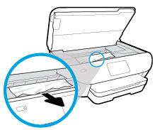 Als u niet alle stukjes papier uit de printer verwijdert, is de kans groot dat er nieuwe papierstoringen optreden. c. Plaats de papierbaankap terug tot ze terug op haar plaats zit. 4.
