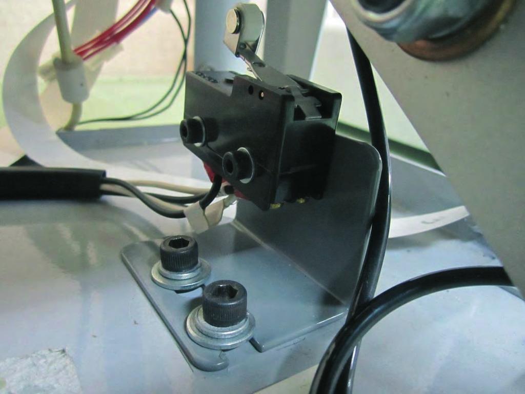 PRE-ASSEMBLE THE PRESS ARM SWITCH (47314) AS SHOWN IN FIGURE 1.