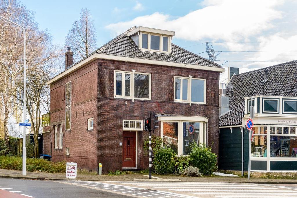 Een geweldig vrijstaand herenhuis met ruime tuin aan de Zaan!