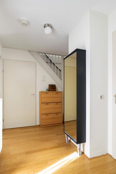 Hallway Ground floor: Hallway with a cupboard (with the electrical installation and the unit for the