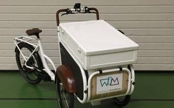 Om het werk op te halen of af te leveren ontving WIM van de Vrienden van Heliomare een prachtige elektrisch aangedreven bakfiets.