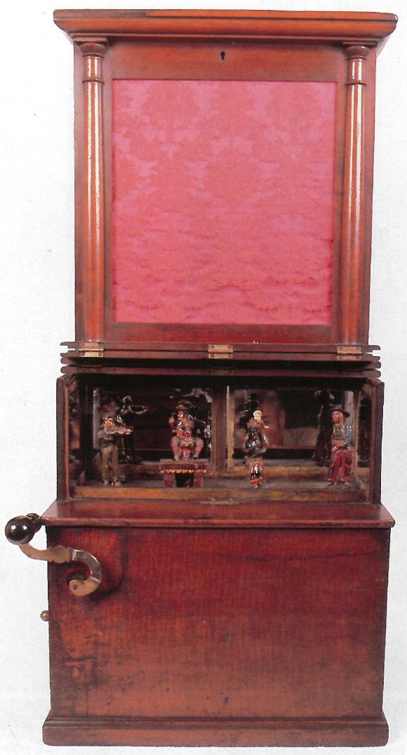 EUROPESE KAHA DI ÒRGEL Bouwjaar 1850 Kleine snaar-cilinder Met dansende figuurtjes Voor