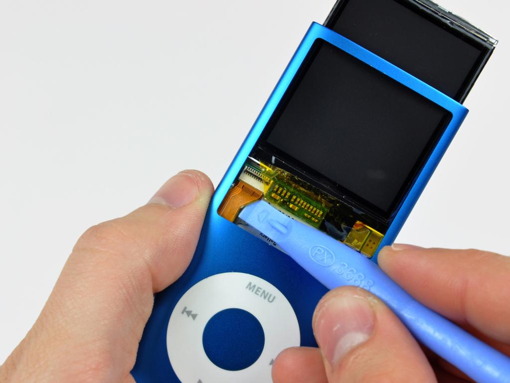 Stap 11 Gebruik een ipod opening tool om de weergave datakabel loslaten van de dunne metalen plaat