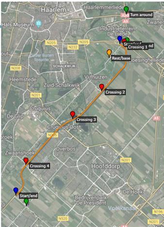 2, Test traject N205 met daarin aangegeven het traject waarop getest gaat worden (oranje traject), de verkeerslichten (rood) en de start en eind punten van de test (blauw).