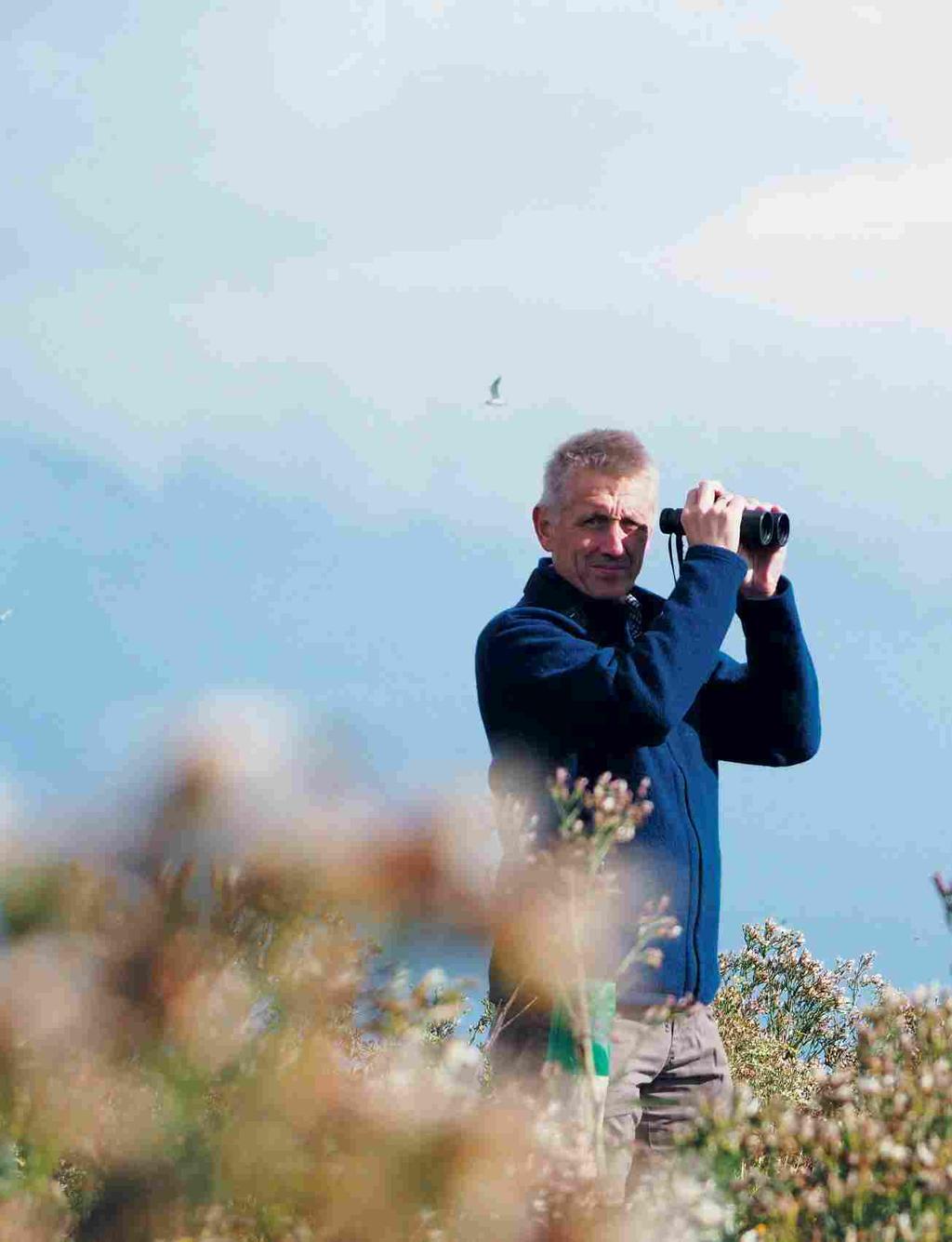 Peter Südbeck, directeur van het nationaalpark, zorgt ervoor dat de Waddenzee niet wordt bedreigd Aan de hemel van de Nedersaksische Noordzee drijven wolken voorbij.