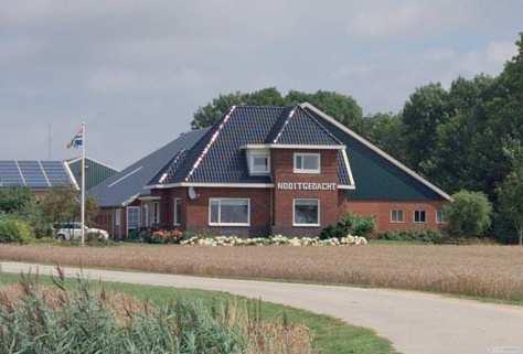 Onderdeel van voormalige Stoomtramweg Maatschappij Oostelijk Groningen. Villavormig woonhuis op samengestelde plattegrond.