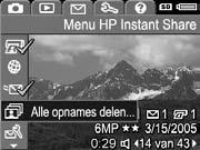 Alle foto's naar bestemmingen verzenden 1. Schakel de camera in, druk op de knop en gebruik de knoppen om naar het menu HP Instant Share te gaan. 2.