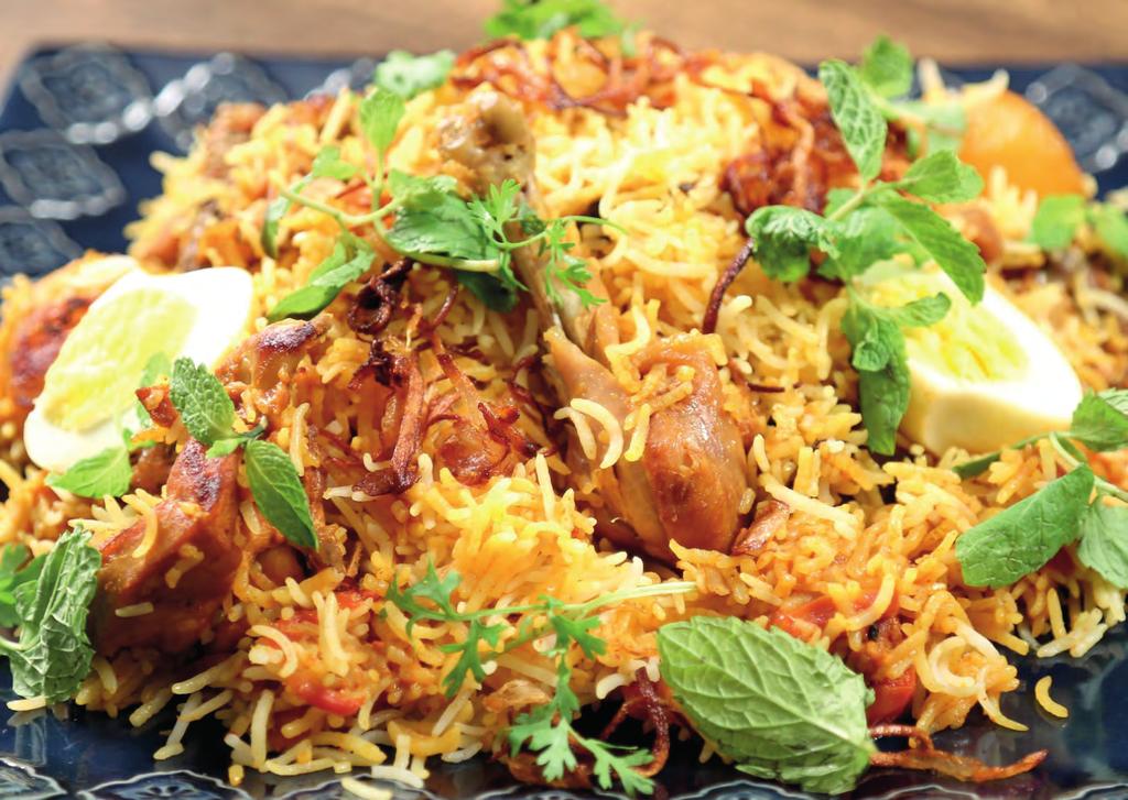 Biryani - Rijst specialiteiten Alle Biryani s worden geserveerd met Raita (yoghurtsaus) All Biryani s will be served with Raita (yoghurt sauce) 70.Persian Chicken Biryani 16.