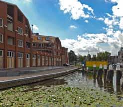 12 13 Minderbroederssteeg Van de Oosthaven naar de Spieringstraat. Genoemd naar het in 141 in Gouda gestichte klooster van de Minderbroeders; het eerste mannenklooster binnen de stadsmuren.