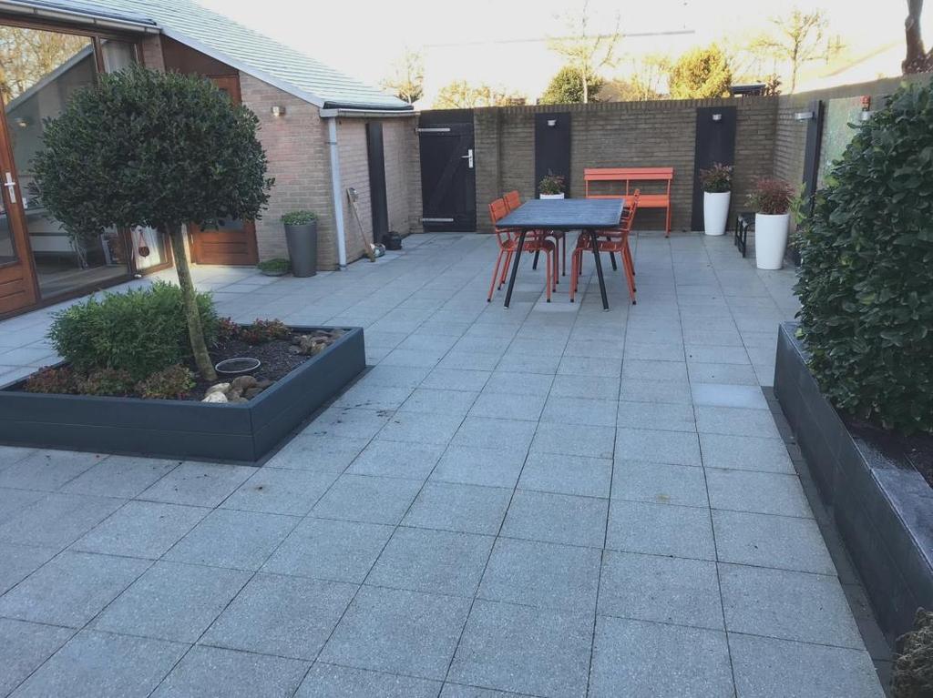 De tuin: Een heerlijke tuin met maximale privacy en veel zon!