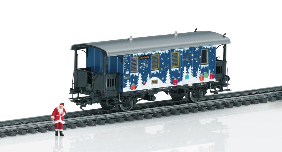 Model: Lageboordwagen beladen met een groep sneeuwpoppen, gemaakt van gelaserd, transparant plexiglas. Lengte over de buffers 54 mm.