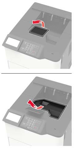 Printer onderhouden 99 Het vervangen van het verhittingsstation met rol 1 Verwijder de klep van de standaardlade. 2 Open klep C. LET OP: HEET OPPERVLAK: De binnenkant van de printer kan heet zijn.