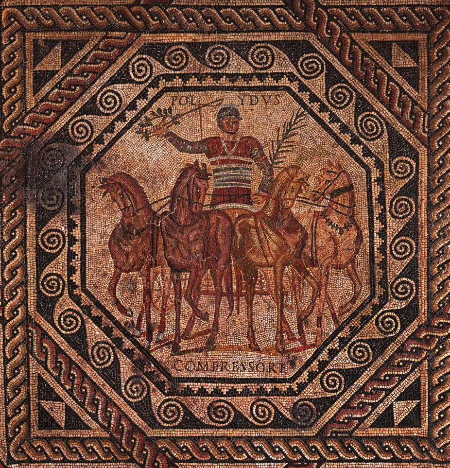 En als je wilt, kun je erover nadenken welke statussymbolen wij tegenwoordig hebben. Een heel bijzonder mozaïek toont een man in een door paarden getrokken wagen. Deze man heet Polydus.