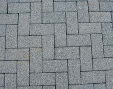 Drainageopeningen Verbrede voegen Klassieke betonstraatstenen Poreuze betonstraatstenen Figuur 3.
