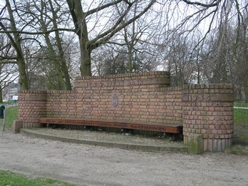 kunstenaar: Charles Estourgie titel: C.A.P. Ivensbank jaartal: 1936 locatie: Hunnerpark Hulde aan den onvermoeide strijder voor de Waaloverbrugging.