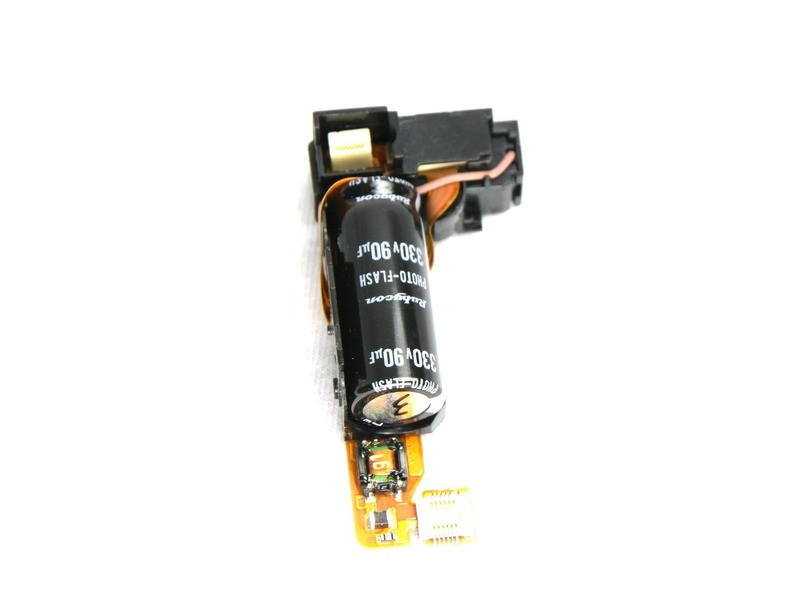 Stap 15 ontkoppel voorzichtig de flash assemblage lint van de zwarte connector slot met behulp van de spudger. Stap 16 Verwijder de flash-assemblage.