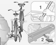 Frame (1) van achterste fiets met één hand vastpakken en voor ontgrendeling aan de lus (2) trekken. Achterste fiets met beide handen vastpakken en het draagsysteem achterzijde naar achteren klappen.