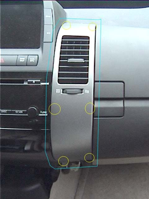 5.) Verwijder het rechtermidden ventilatiepaneel (naast de radio).
