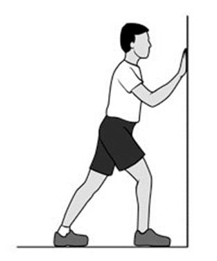 1. Heel Cord Stretch Herhalingen 2 sets van 10 Gastrocnemius-soleus complex Benodigdheden: Geen Sta tegenover een muur met uw gezonde been naar voren met de knie licht gebogen.