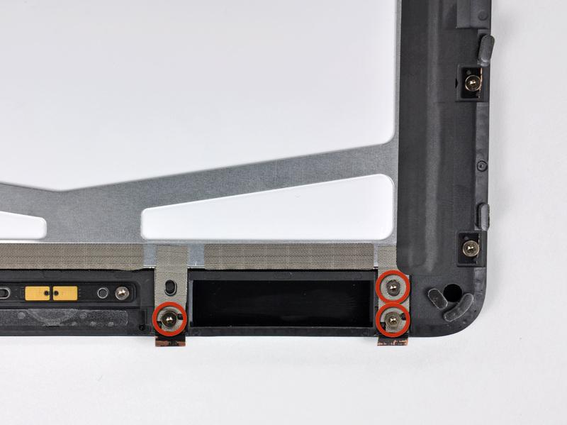 Stap 12 Verwijder de drie T5 Torx-schroeven waarmee de clips en LCD beugels bedekt met EMI tape in