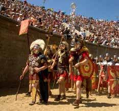 gladiatoren strijden om de eeuwige roem. Of ze nemen een Romeinse massage in het badhuis of maken een eigen fibula. www.archeon.