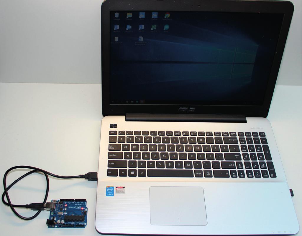 10 1 Aftrap 1.6 Arduino met pc verbinden Afbeelding 1.10 USB-verbinding tussen Arduino UNO en laptop. Om de Arduino vanaf je pc of laptop te programmeren, moeten ze met elkaar kunnen communiceren.