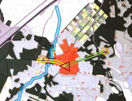 De rol van het plein als huiskamer van het dorp wordt verbeeld door zitelementen onder de platanen die ontworpen