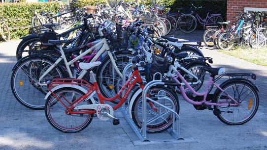 Hierdoor kunnen fietsen met een bredere band/voorvork dan standaard ook geparkeerd worden.