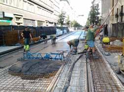 Er is bijgevolg geopteerd om het beton vanuit de zijstraten te pompen.