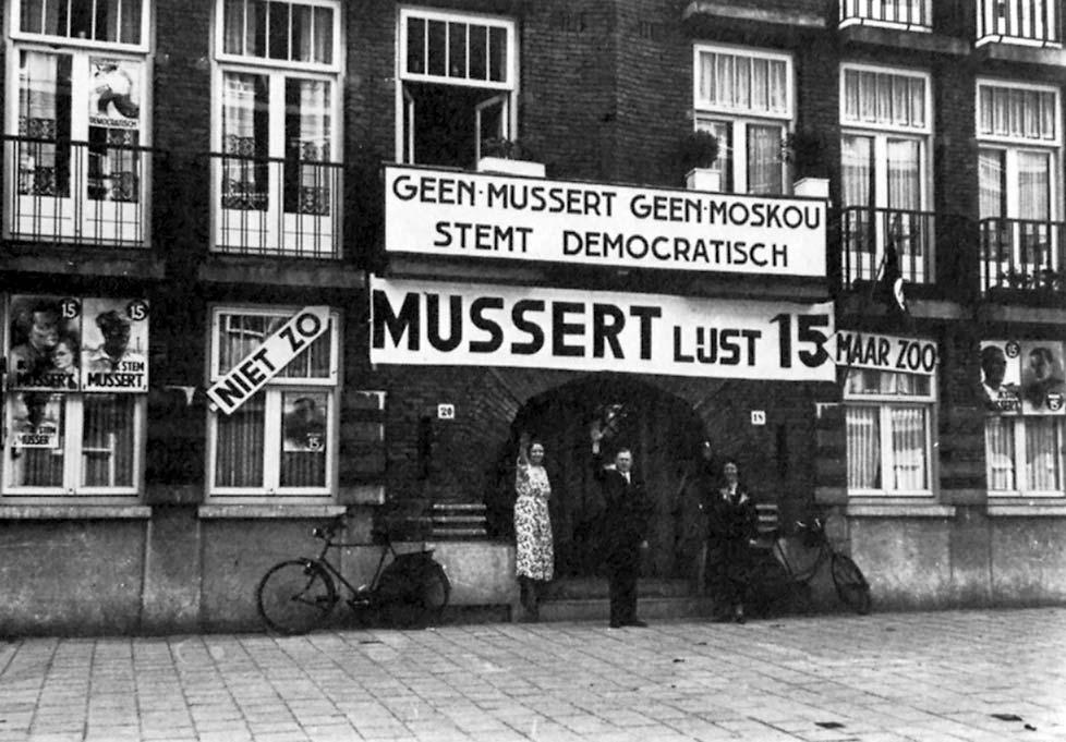 bron 11 Een foto van de verkiezingsstrijd in 1937. Gebruik bron 11. 1p 22 In 1931 werd door Anton Mussert de NSB opgericht.