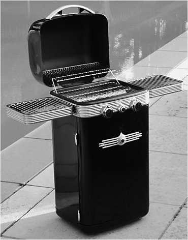 1p 9 Bij de grotere filialen van Albert Heijn kun je deze week een gasbarbecue kopen. Een klant koopt de afgebeelde gasbarbecue.