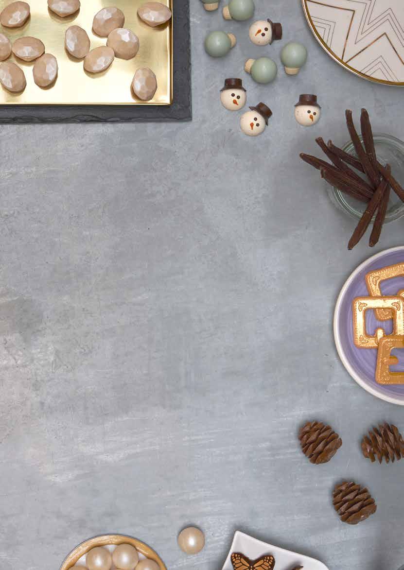 Decoratie is hét instrument om producten in de kijker te zetten DOBLA Al het gebak uit dit magazine is gedecoreerd met decoratie van Dobla.