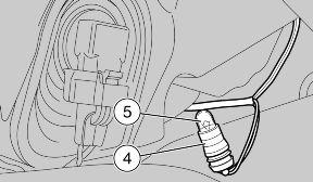 When replacing: TAIL LIGHT BULB CAUTION DO NOT PULL THE ELECTRICAL CA- BLES WHEN TAKING OUT THE BULB HOLDER.