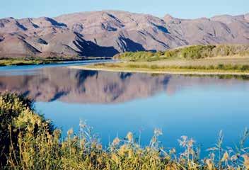 Norotshama River Resort *** Ligging: In het uiterste zuiden van Namibië, 50 km ten noordwesten van het dorp Noordoewer. Prachtig gelegen aan de oevers van de Oranje Rivier.