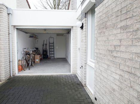 De serre zorgt voor een verlengstuk van de tuin in alle seizoenen.