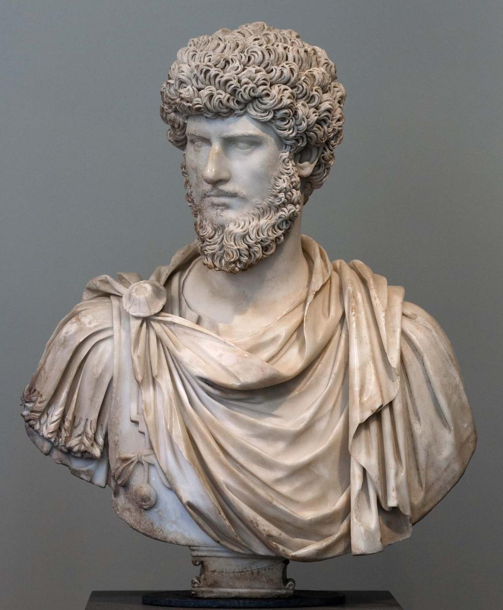 LUCIUS VERUS 161-169 Lucius Ceionius Commodus Aurelius Verus Geboren in 130, geadopteerd door Antoninus Pius in 138, en vanaf 161 mede-keizer naast
