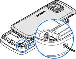 Plaats de punt van de stylus in de opening onder de batterij en duw de SIM-kaart opzij, zodat deze uit de sleuf komt. Trek de SIM-kaart eruit. 4. Plaats de batterij en achtercover terug.